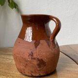 Glazed earthenware jug