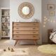 Renovated vintage commode from the 1960s in oak with slanted profile and tapered legs.