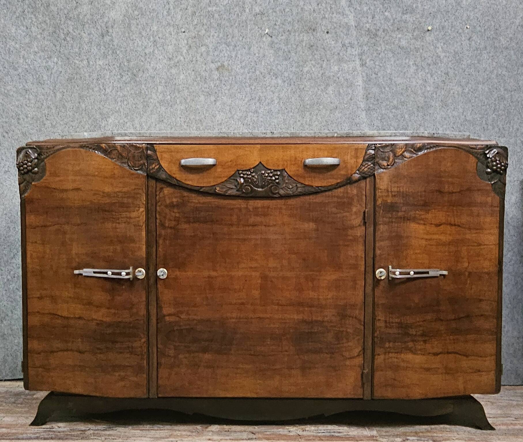 Sideboard in a row, Art Deco period, in mahogany.