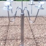 Standing candlestick in stainless steel metal with 5 movable branches, with smooth ring for 4 cm candles.