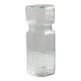 Glass condiment jar.