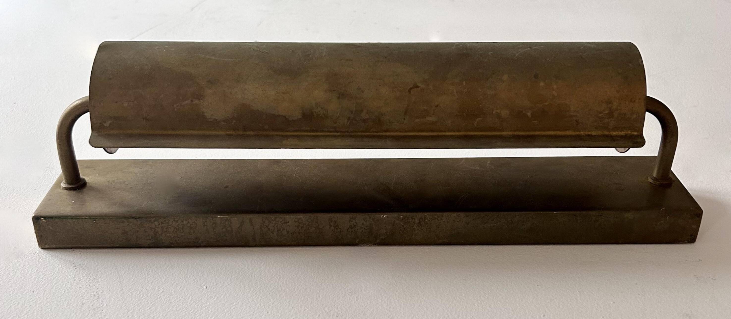 Modernist solid brass wall light, France 1940