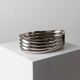 Vintage silver-plated metal bowl with curved relief design, Italy 1960s, elegant appetizer plate