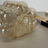 Amber vintage glass wall lamp by Helena Tynell for Glashütte Limburg, 1970s