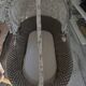 Wicker bassinet on legs