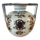 Old vase with floral motif inspired by desvres earthenware