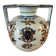 Old vase with floral motif inspired by desvres earthenware