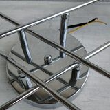 Articulated chromed metal luminaire