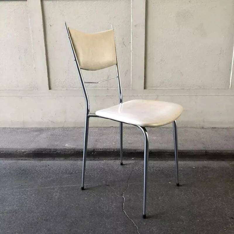 Vintage cream faux leather chair