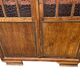 Vintage wooden display cabinet with textured glass.
