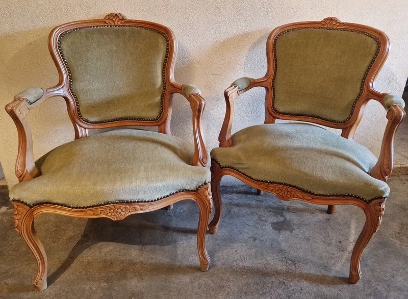 Pair of Louis XV style armchairs in cherry wood, upholstered in green velvet.