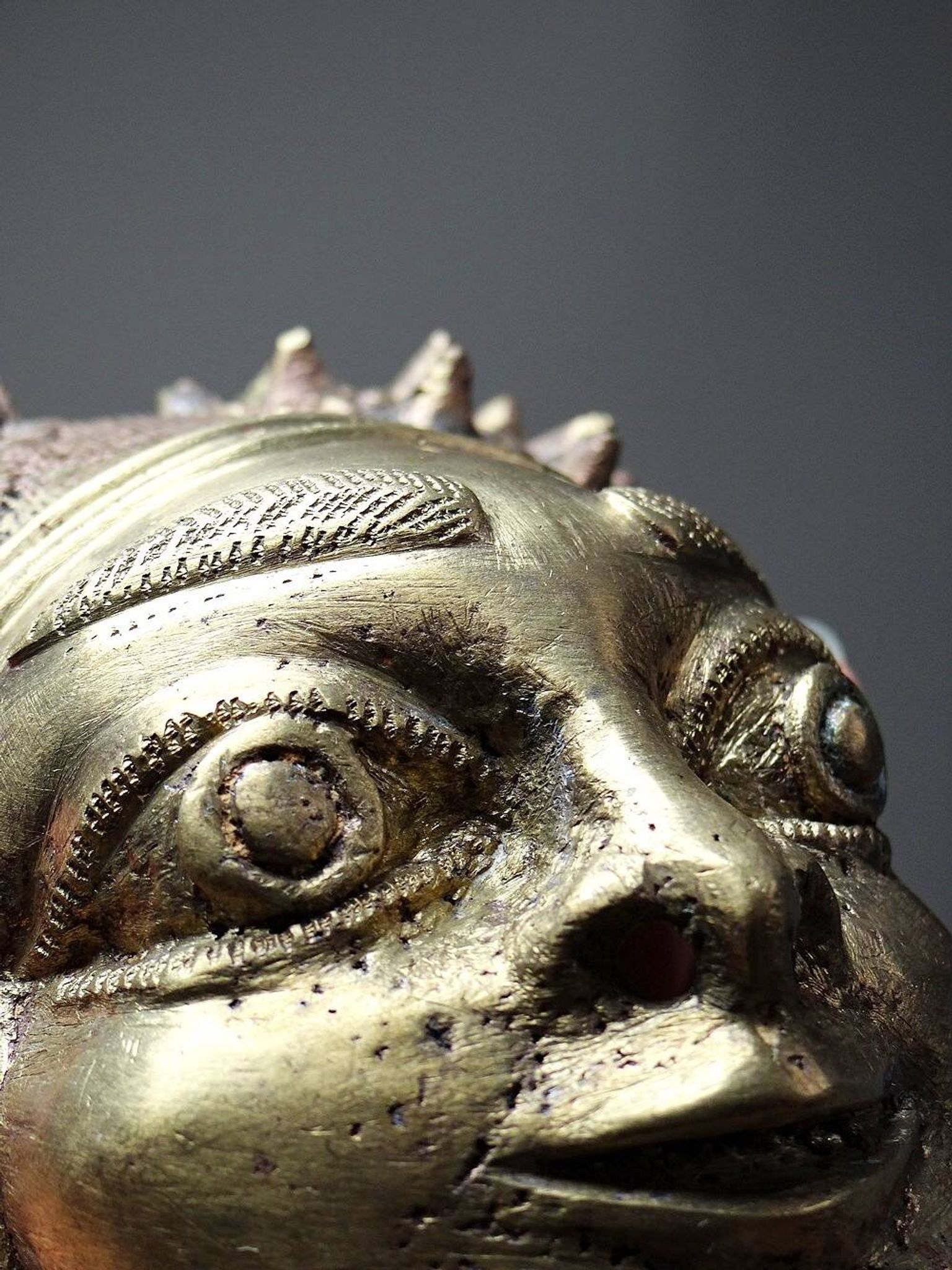 Small gilded bronze Oba mask from Bamoun, Cameroon, vintage Africa