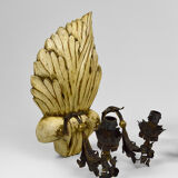 Pair of Hollywood Regency sconces in carved, painted and patinated wood, 1950s