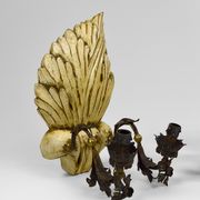 Pair of Hollywood Regency sconces in carved, painted and patinated wood, 1950s