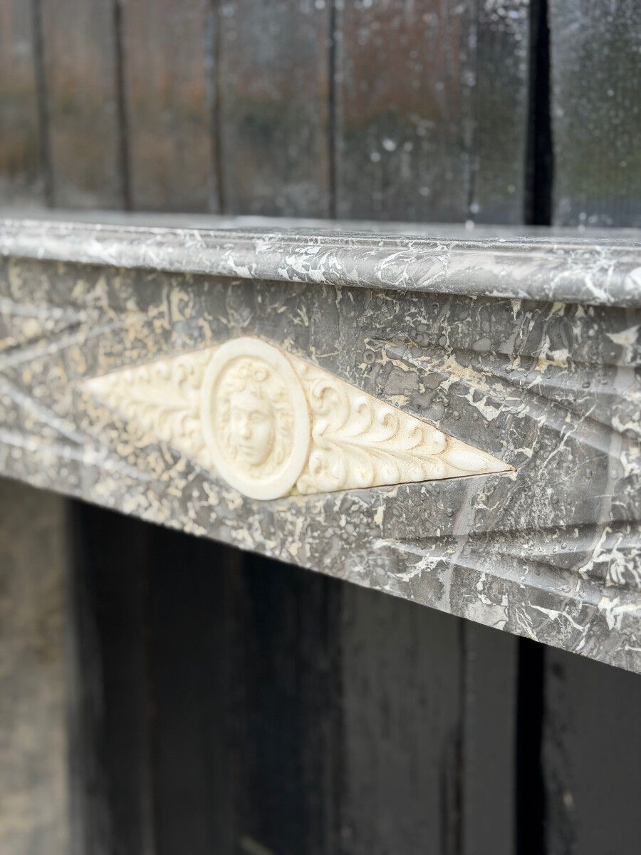 Directoire fireplace in grey marble Sainte-Anne, early 19th century