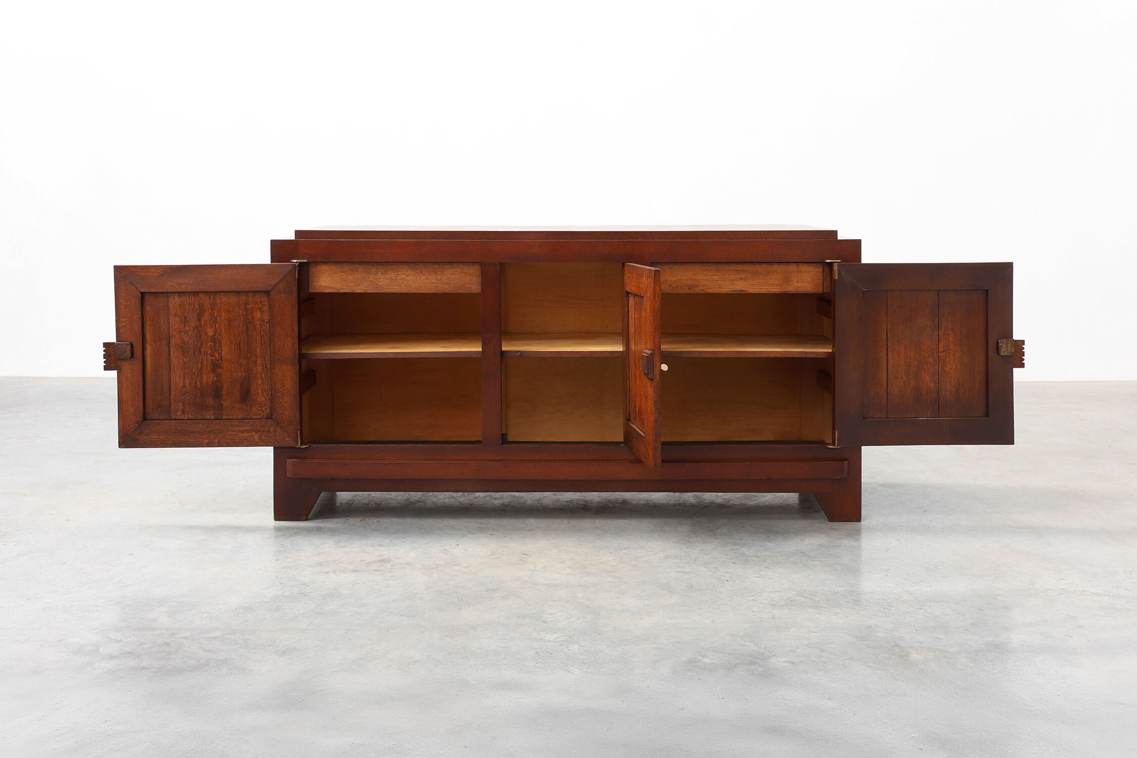Art Deco carved geometric sideboard by Charles Dudouyt in oak, France ca. 1