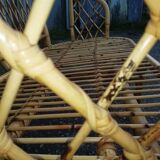 Old wicker rattan armchair