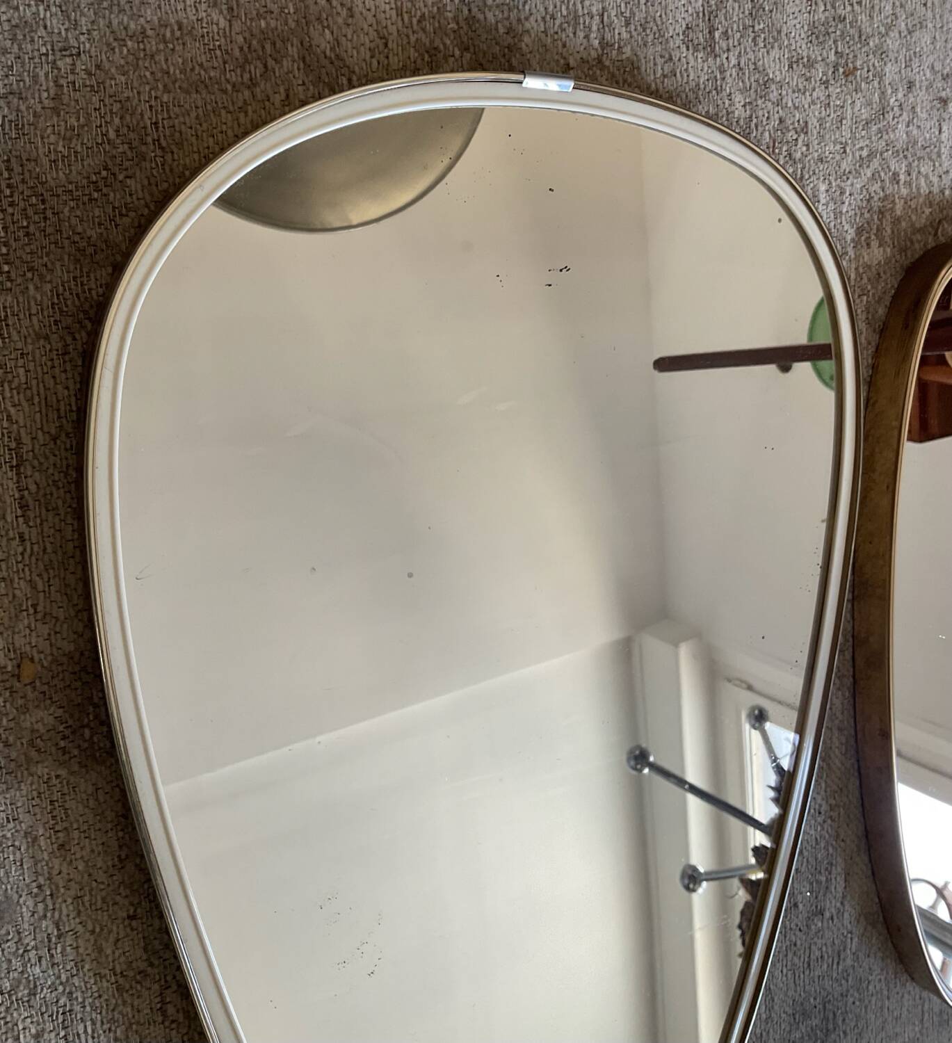Trio of asymmetrical free-form mirrors from the 60s and 70s