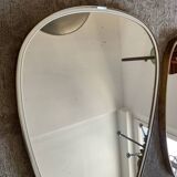Trio of asymmetrical free-form mirrors from the 60s and 70s