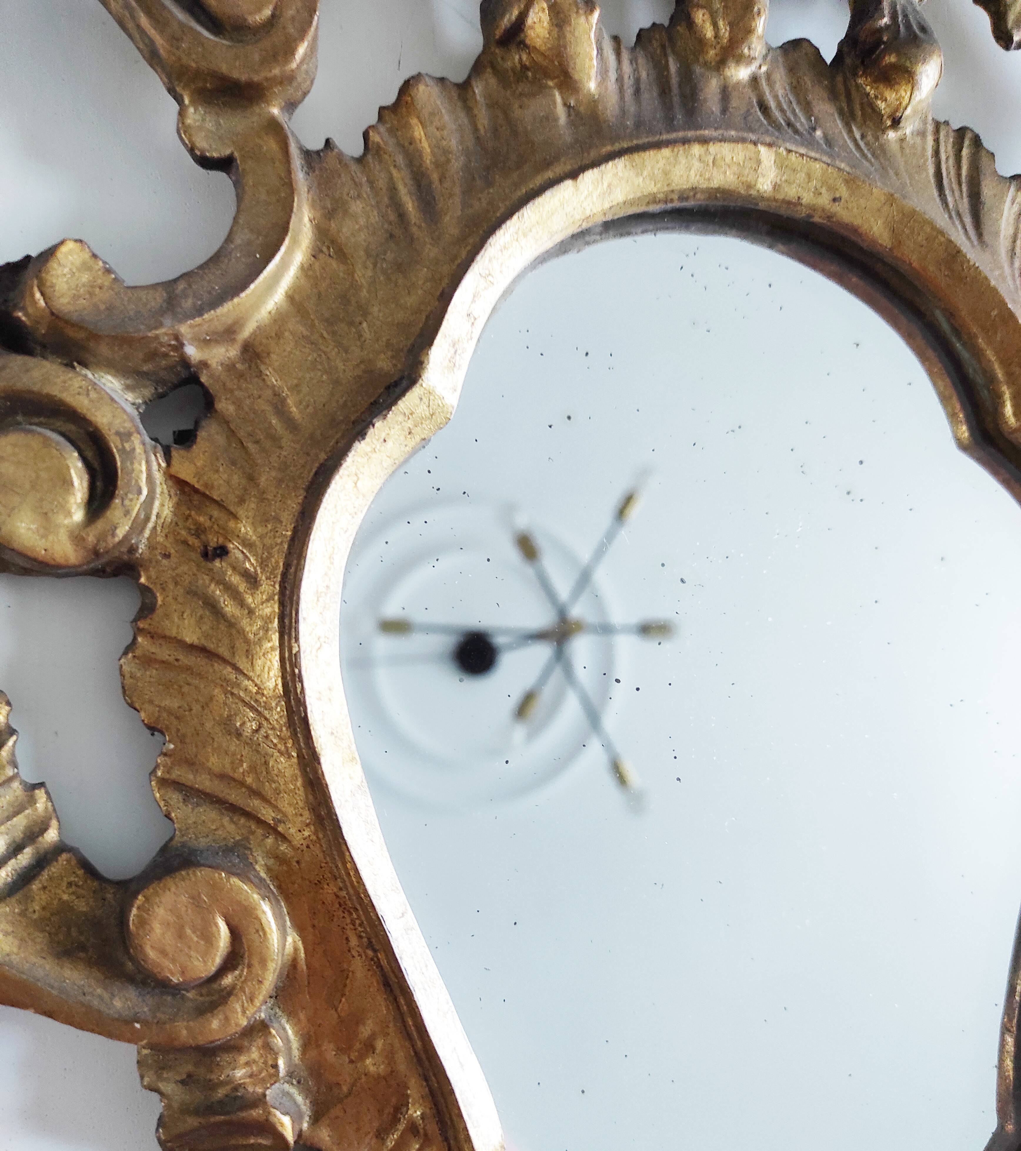 Gilded wood mirror, 56 x 32 cm