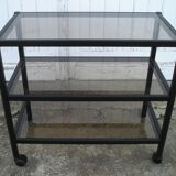 Rolling table serves 3 trays of smoked glass