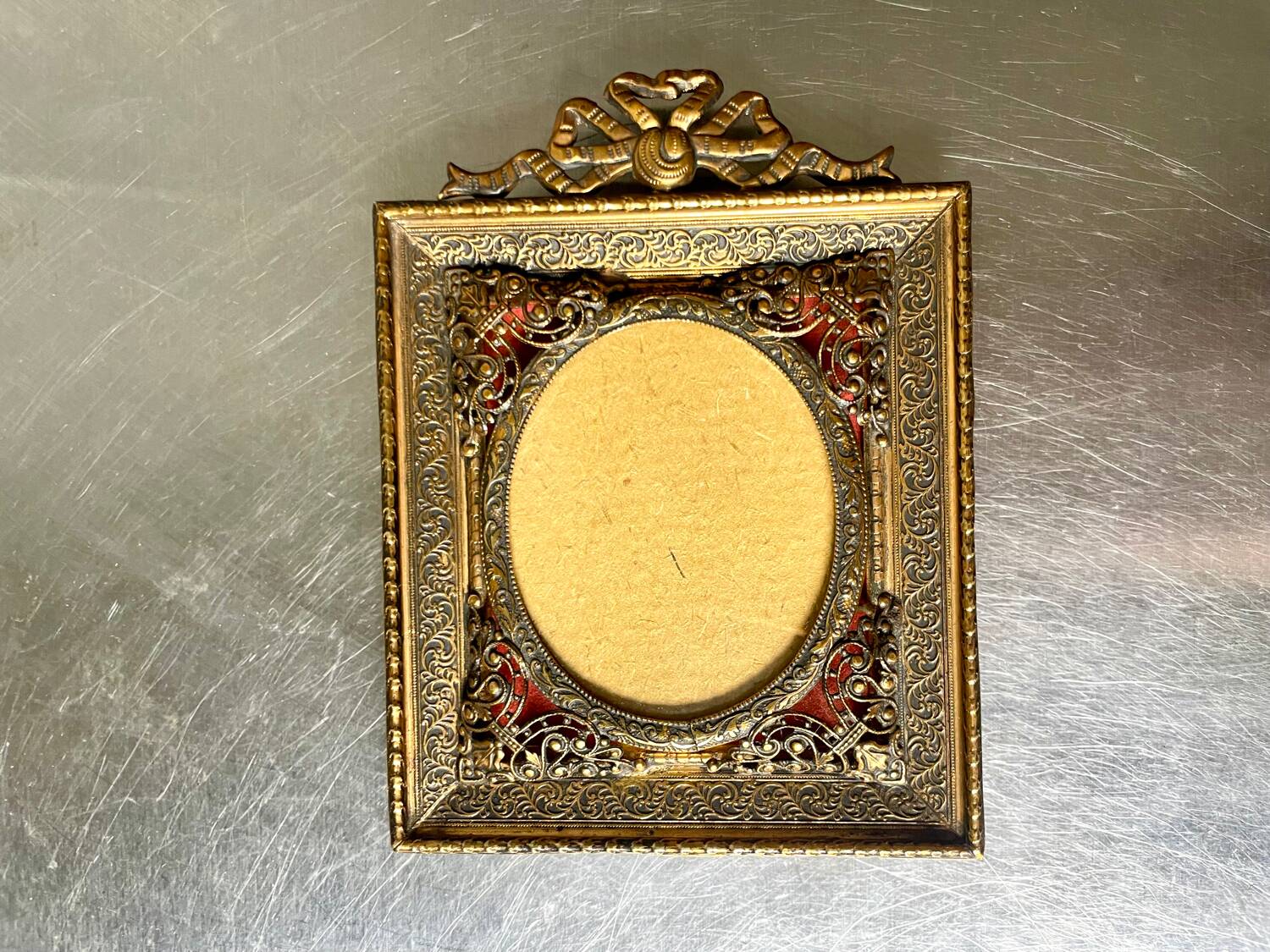 Antique metal frame gold coloured brass   frame 10.5 cm x 9 cm  convex glass