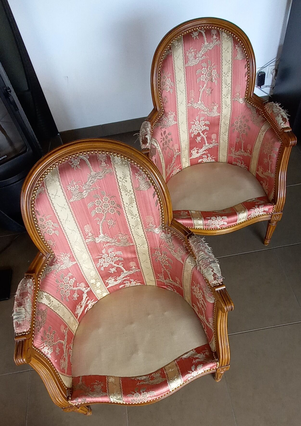 Pair of Louis XVI style armchairs in walnut and pink silk and ecru