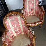 Pair of Louis XVI style armchairs in walnut and pink silk and ecru