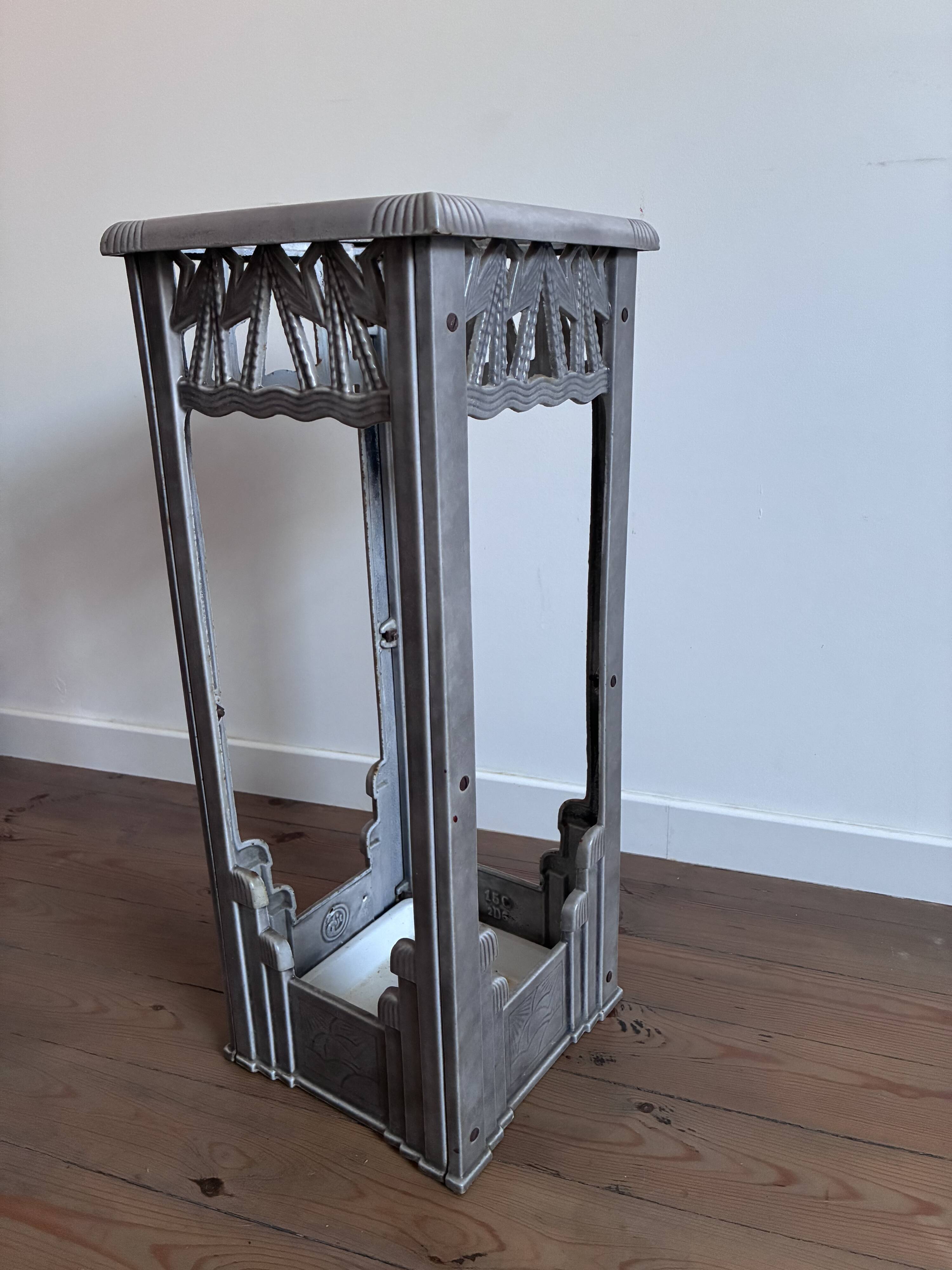 Art Deco umbrella stand from the 1930s, cast iron.