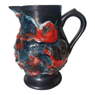 Glazed ceramic pitcher