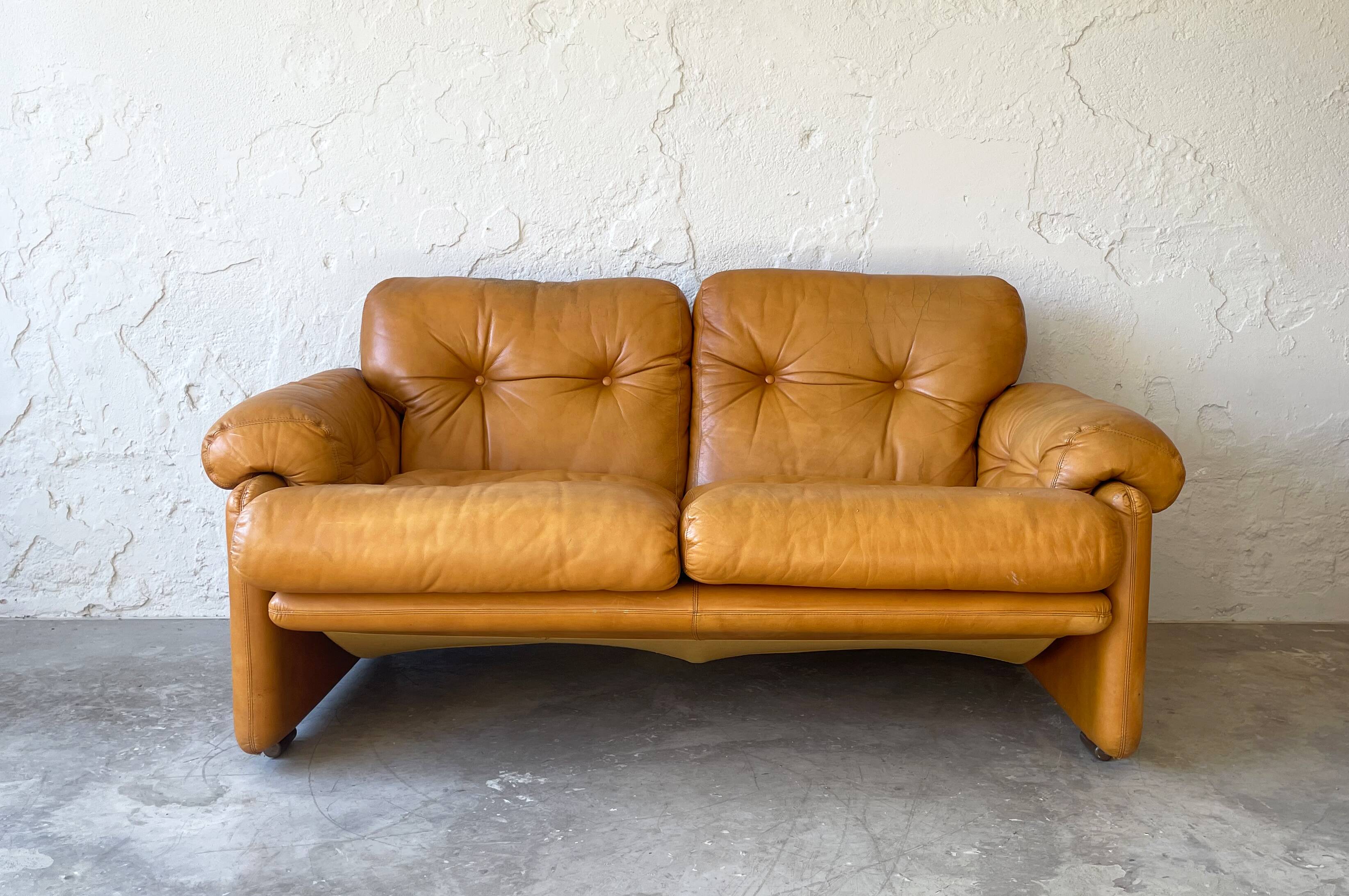 Two seats leather sofa, by Tobias Scarpa