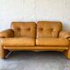 Two seats leather sofa, by Tobias Scarpa