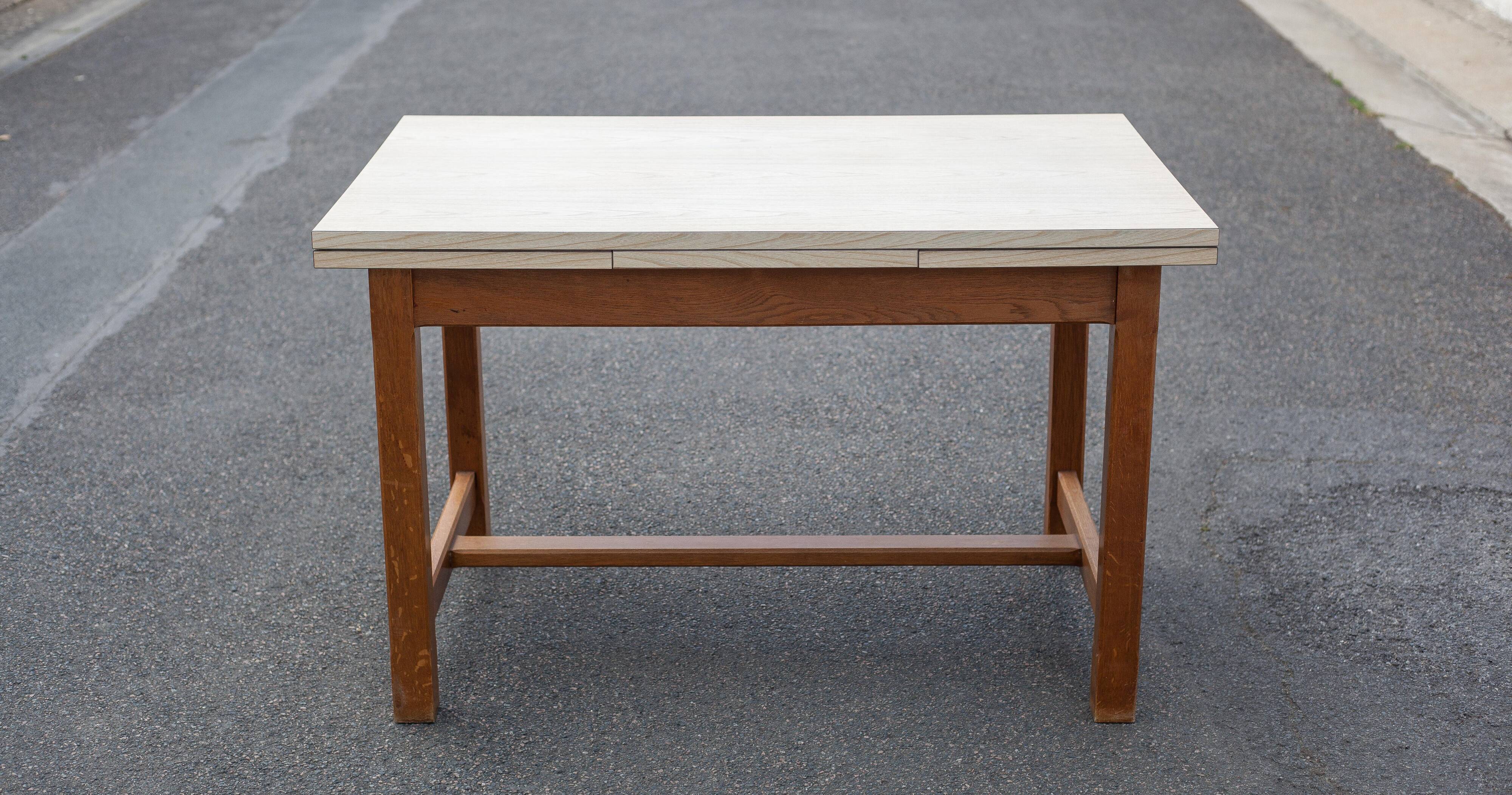Wood and formica table with extensions