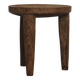 Antique stool made of raw wood carved from a single trunk