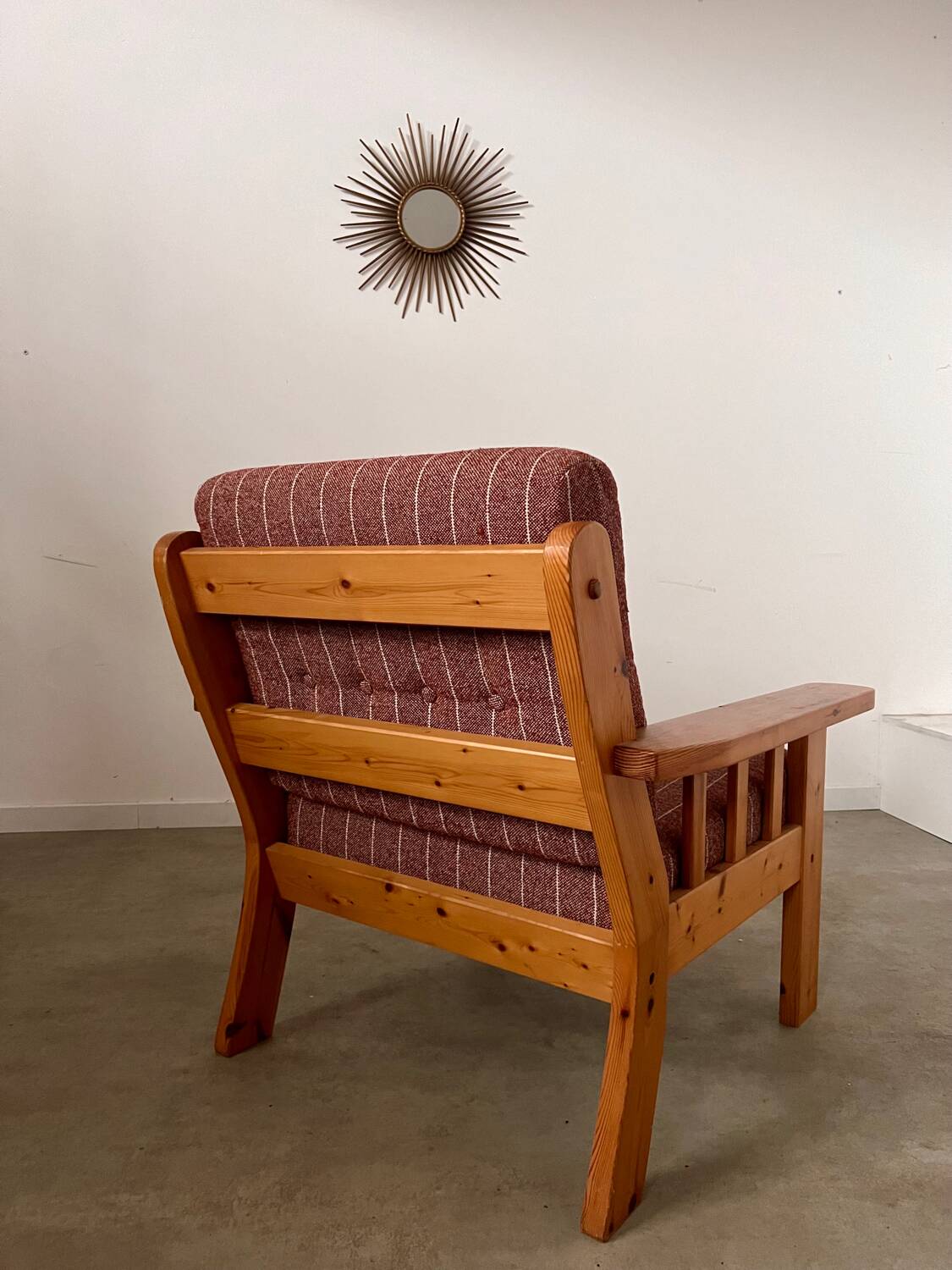 Old vintage Scandinavian design pine armchair from the 70s