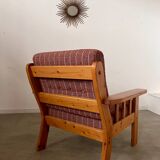 Old vintage Scandinavian design pine armchair from the 70s