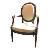 Louis XVI period cabriolet armchair with medallion back