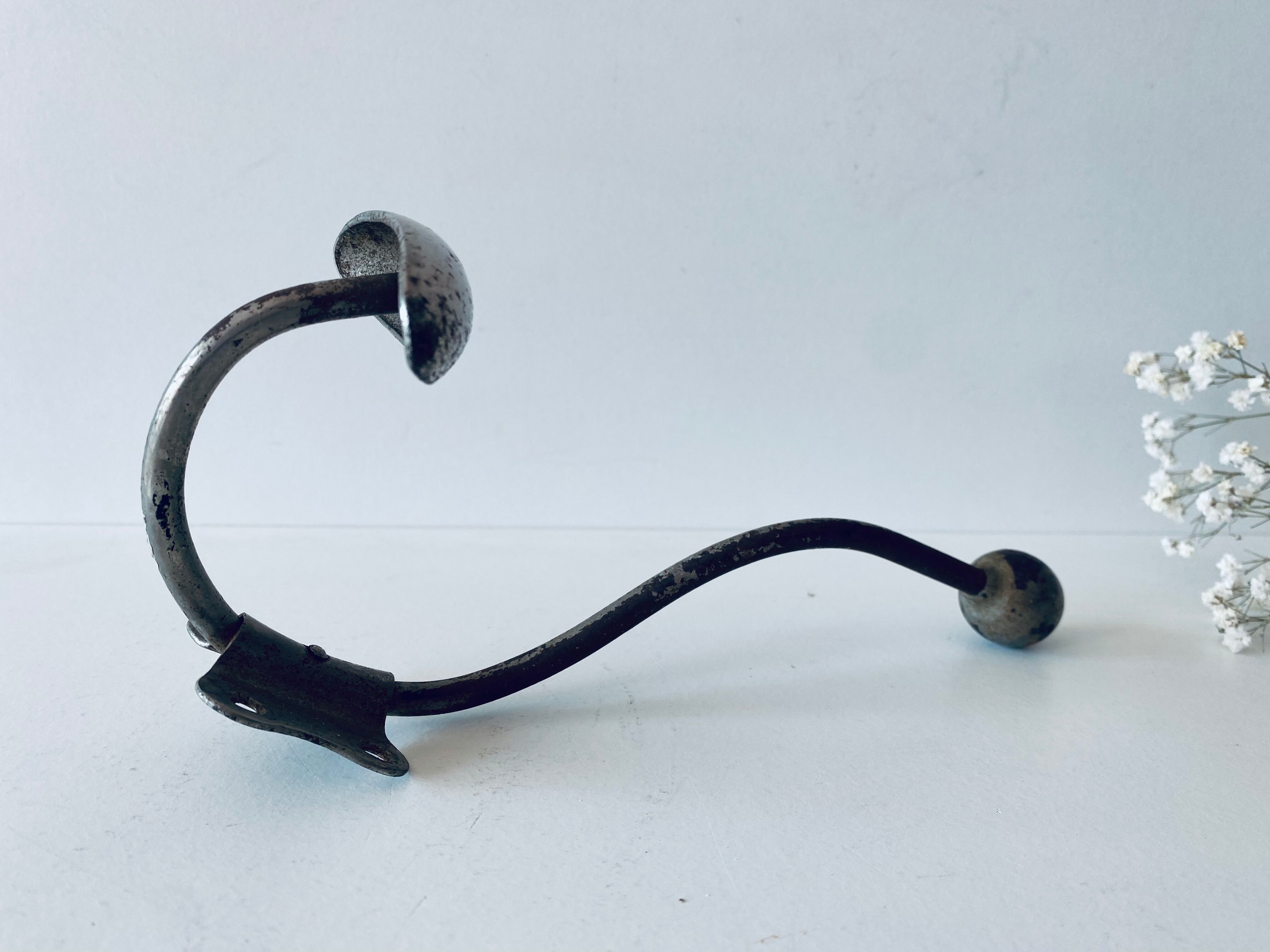 Ancient metal patère