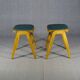 2 Mid-century green vinyl stools with compass legs from the 1960s.
