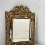Miroir a pare closes de style Louis XIV en bois et stuc doré XIX siècle