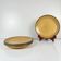 Set of 4 Salins plates with green rim, 20th century