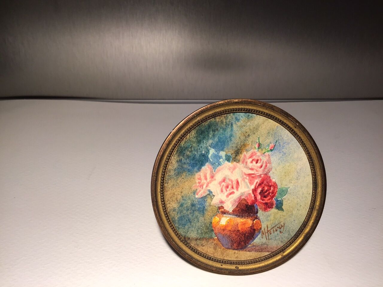 Three old paintings, still lifes with bouquets of roses, signed M Henry
