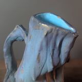 Brutalist jug numbered 52 in turquoise and blue painted terracotta