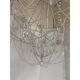 Contemporary ivory florentine iron and crystals chandelier