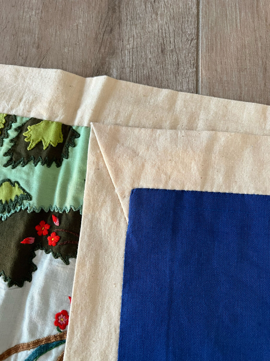 Embroidered wall hanging