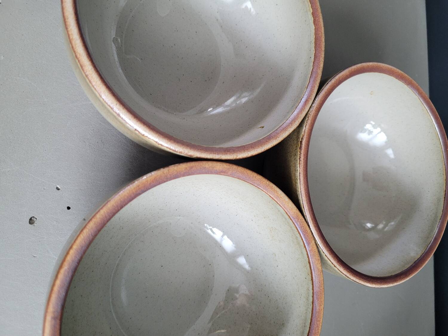 Trio of vintage stoneware bowls