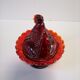 Poule en verre orangé sucrier