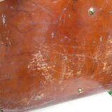 Old monogrammed leather travel suitcase and barony crown