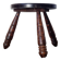 Small brutalist tripod stool made of turned wood.