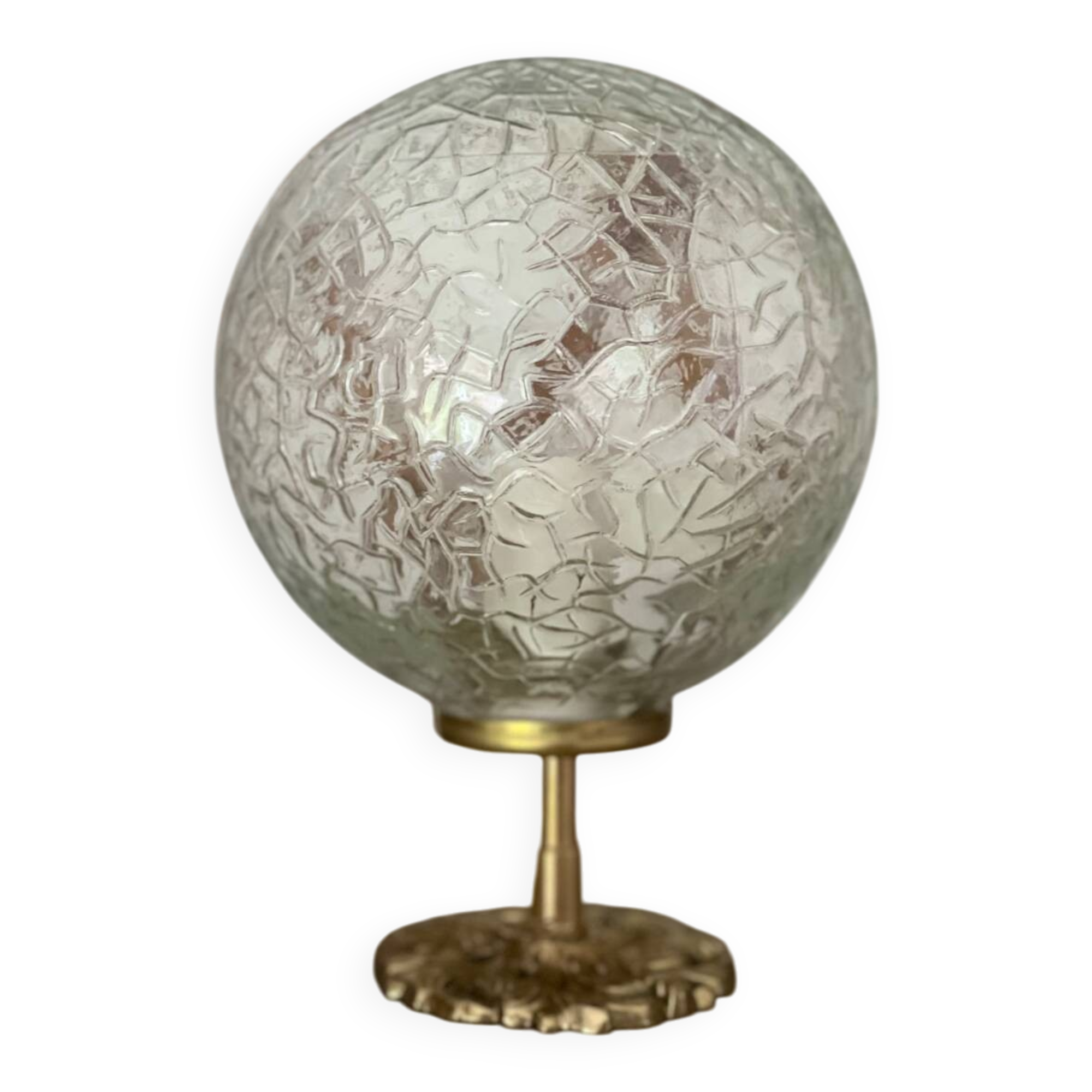Small handcrafted globe lamp with a cracked finish and a golden brass base.